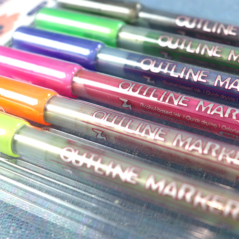 Set of 6 marker pens with a metallic fill and colourful outer edge.